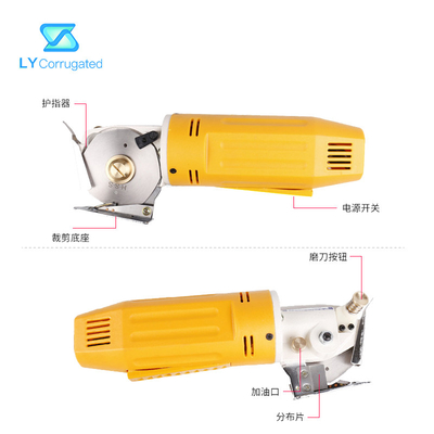 Tijeras eléctricas amarillas de la tela 170W alrededor de piezas de maquinaria portátiles de la materia textil de la cuchilla de corte